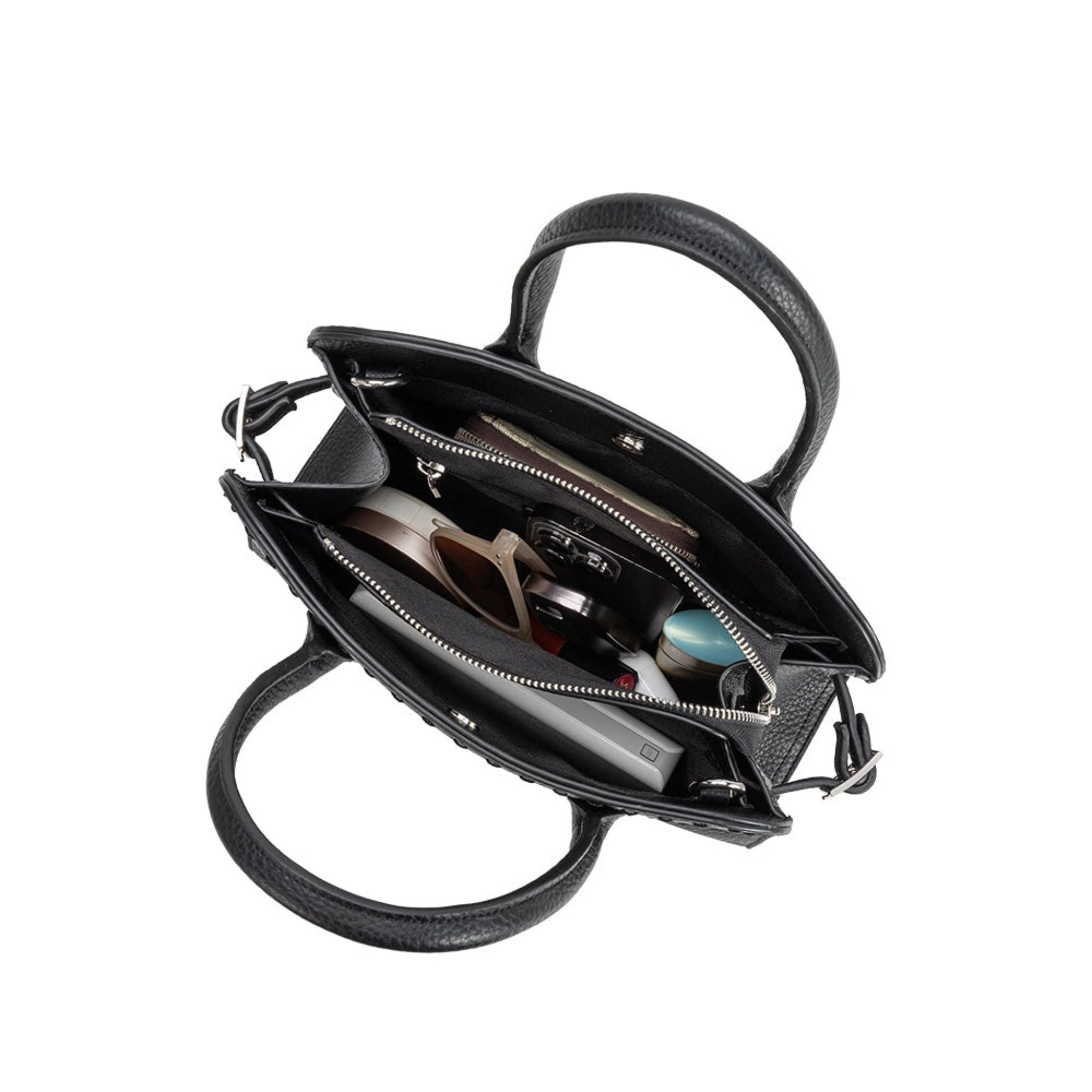 Black handbag with interior details on a white background