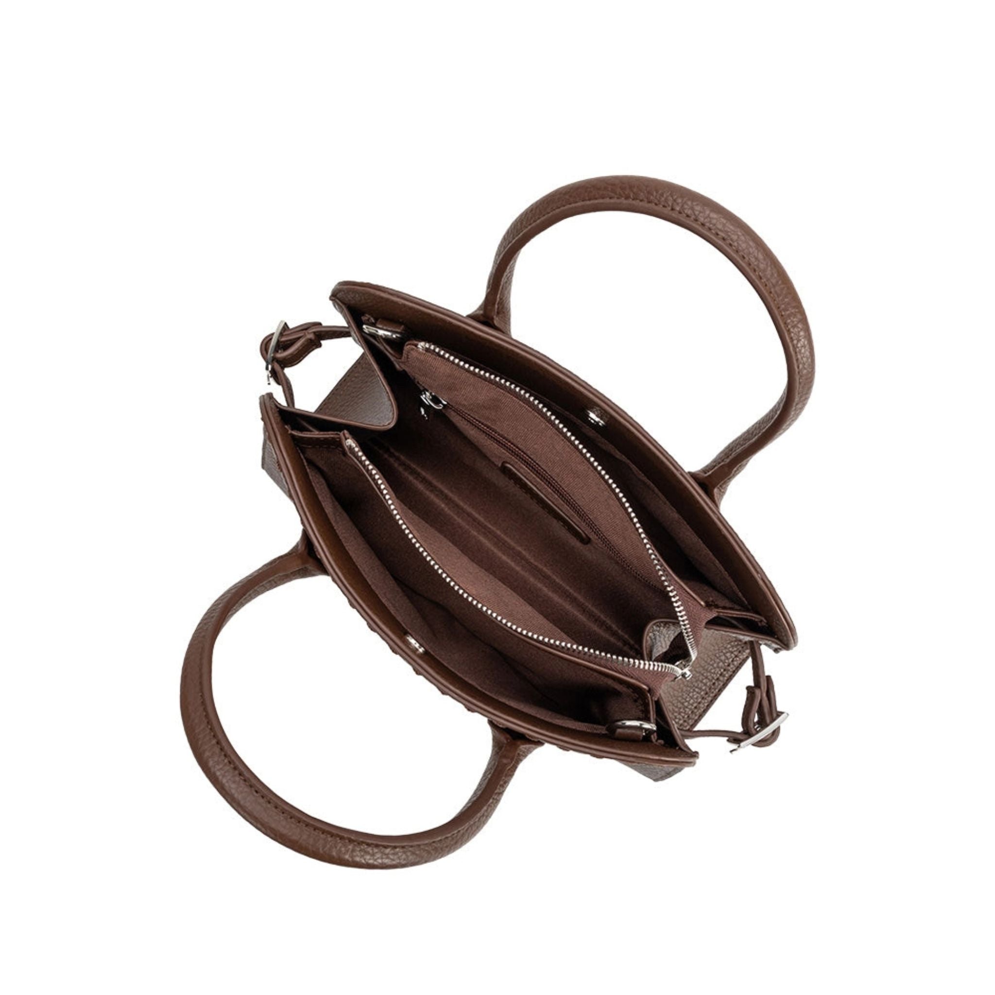 Brown leather handbag with open front compartment on a white background