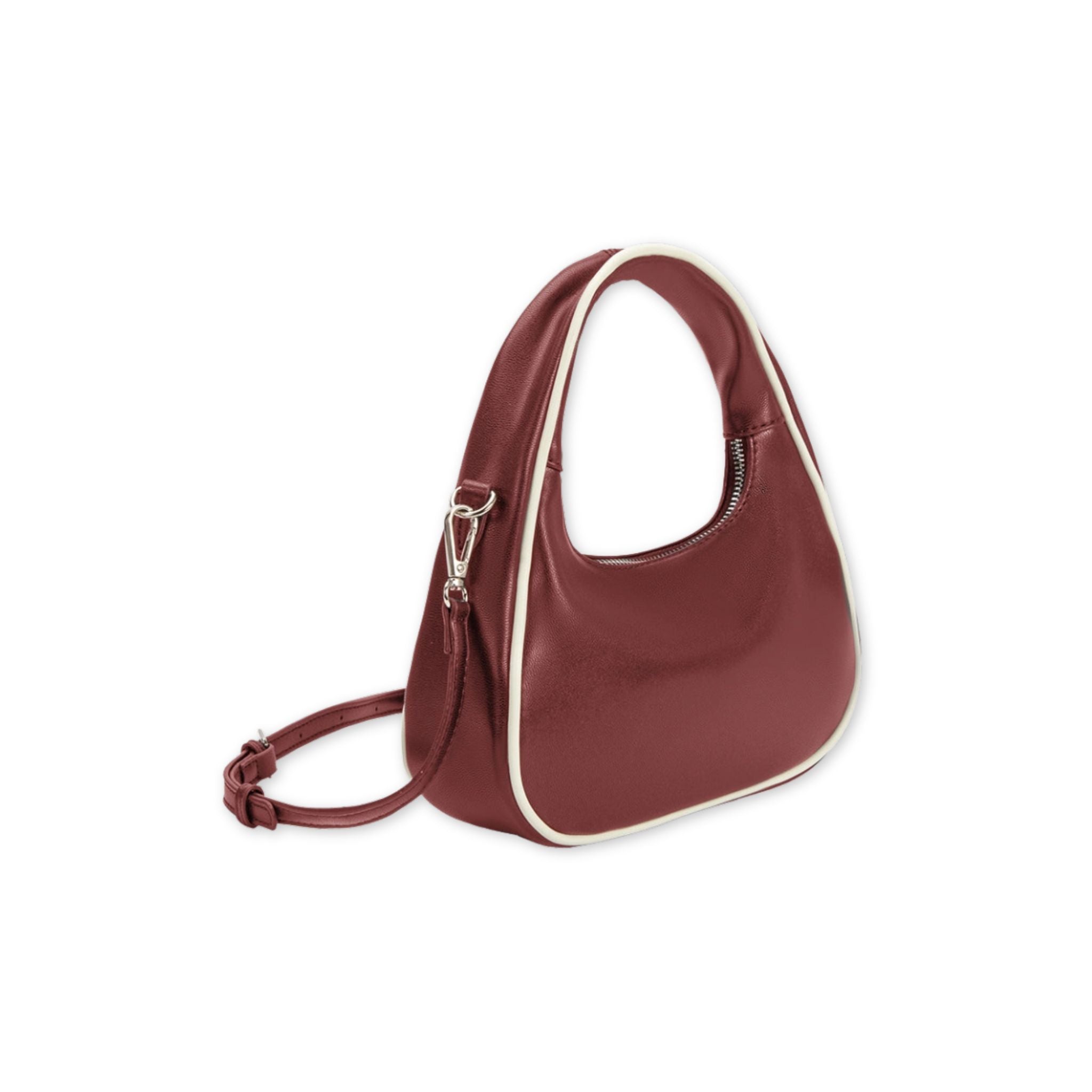 Angled view of a burgundy handbag with white trim on a white background