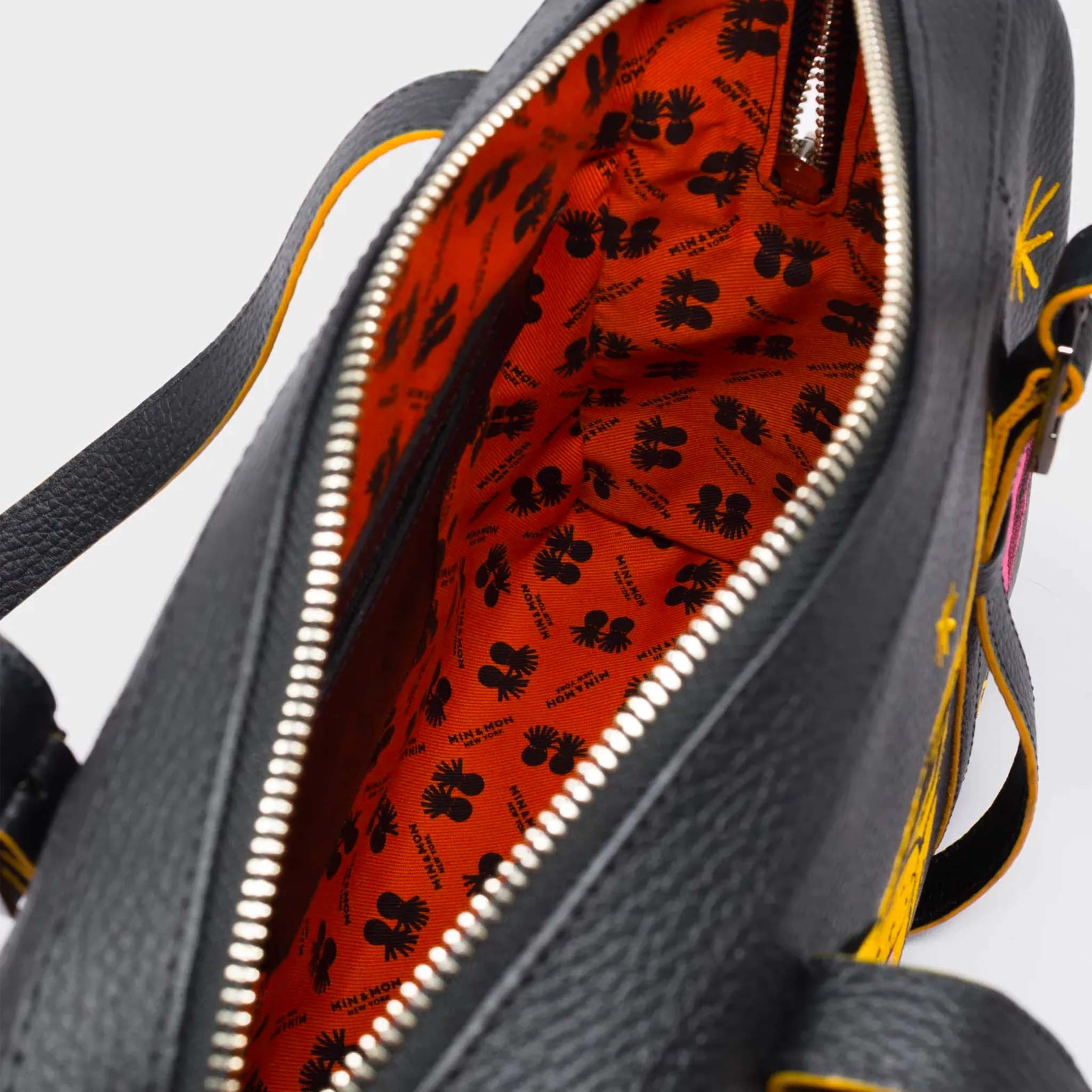 Close up of inside Min & Mon' Esther Black Satchel Bag - Happy Tiger Embroidery