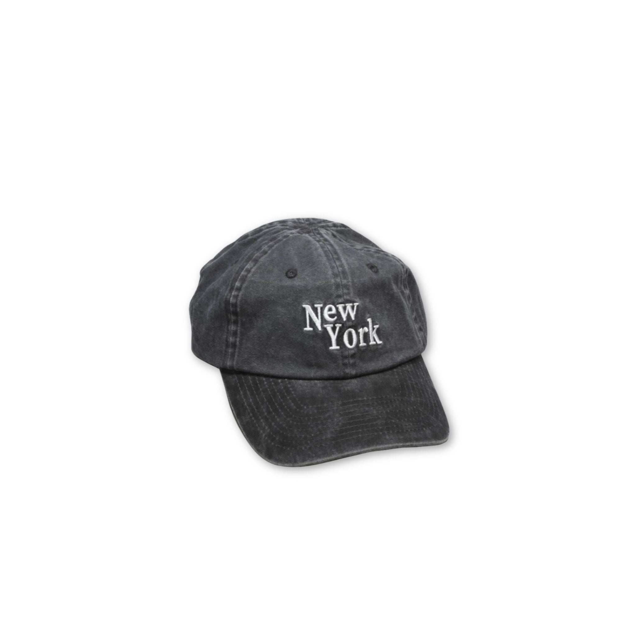 Black washed out cap with 'New York' text on a white background