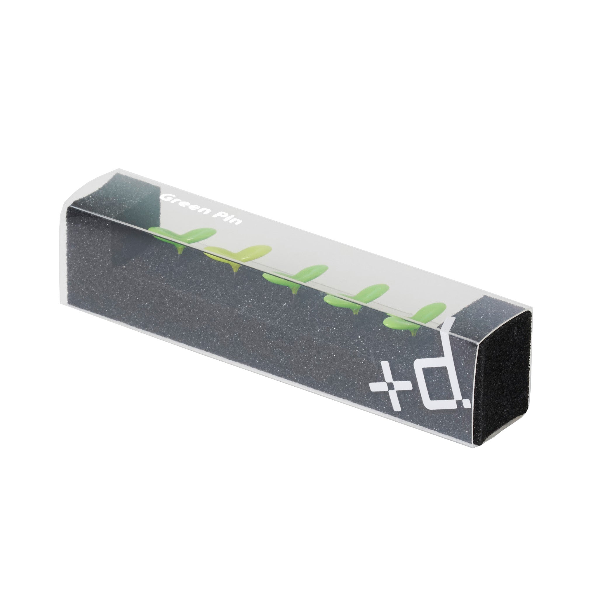 A clear rectangular box containing several green leaf-shaped push pins neatly arranged inside black foam packaging. The box is labeled “Green Pin” with the minimalist +d logo printed on the side.