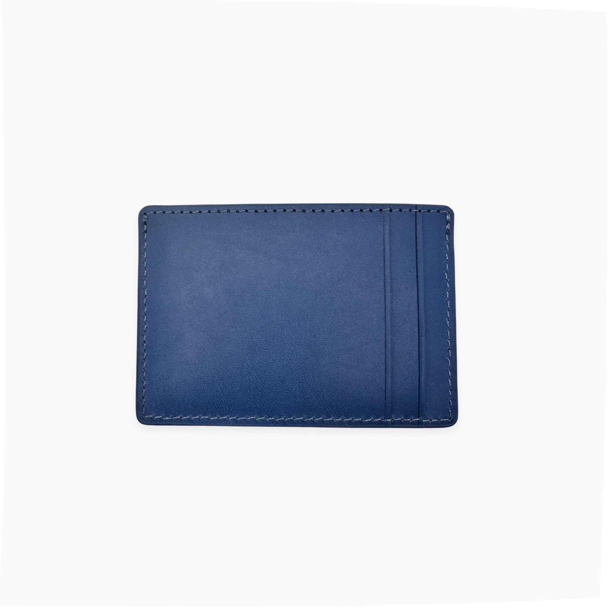 Back image of the navy leather card holder by Curated Basics