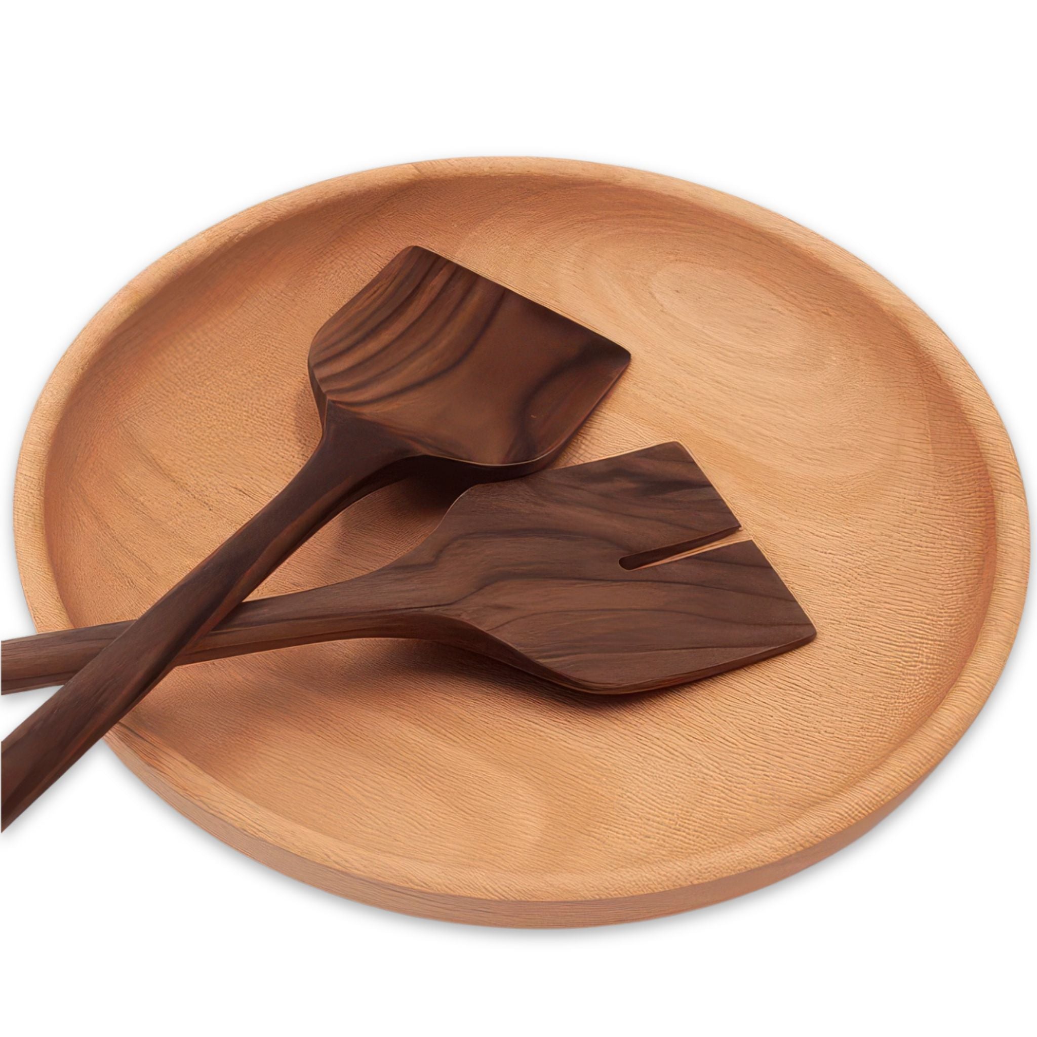Image of a pair of spatulas laying on top of the large beech shallow bowl