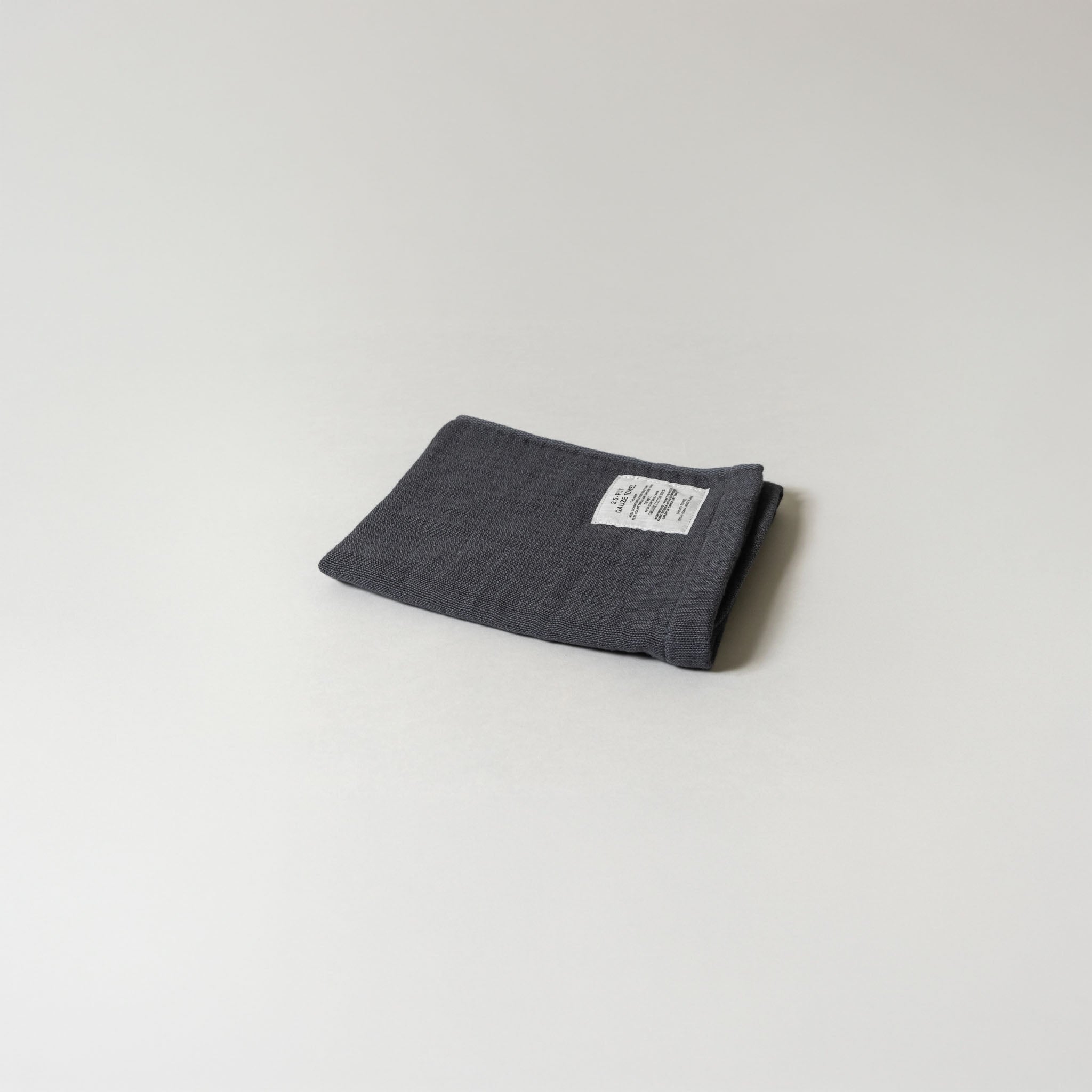 Charcoal 2.5-Ply Gauze Kitchen Towel folded on a light grey background