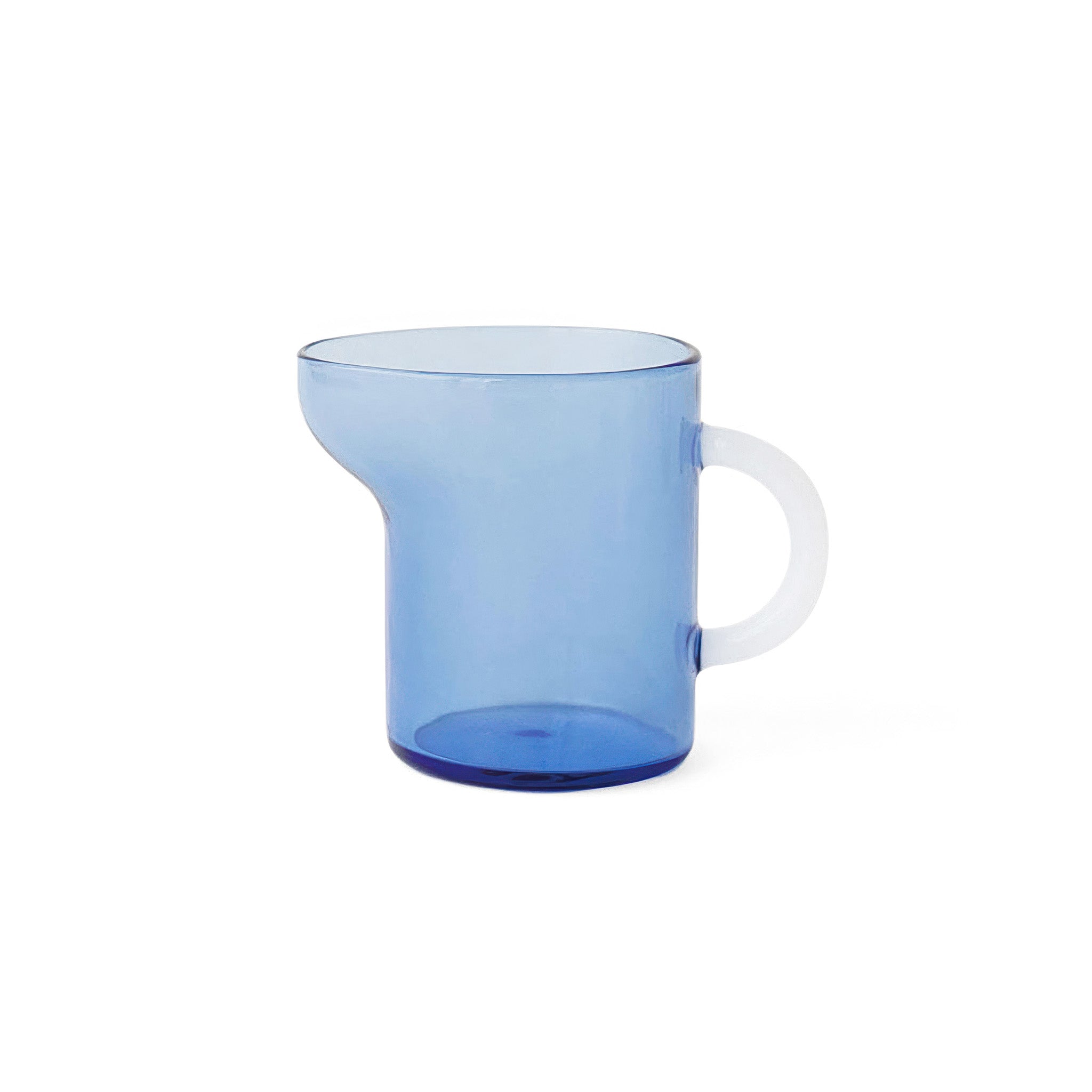 Blue glass mini pitcher on a white background