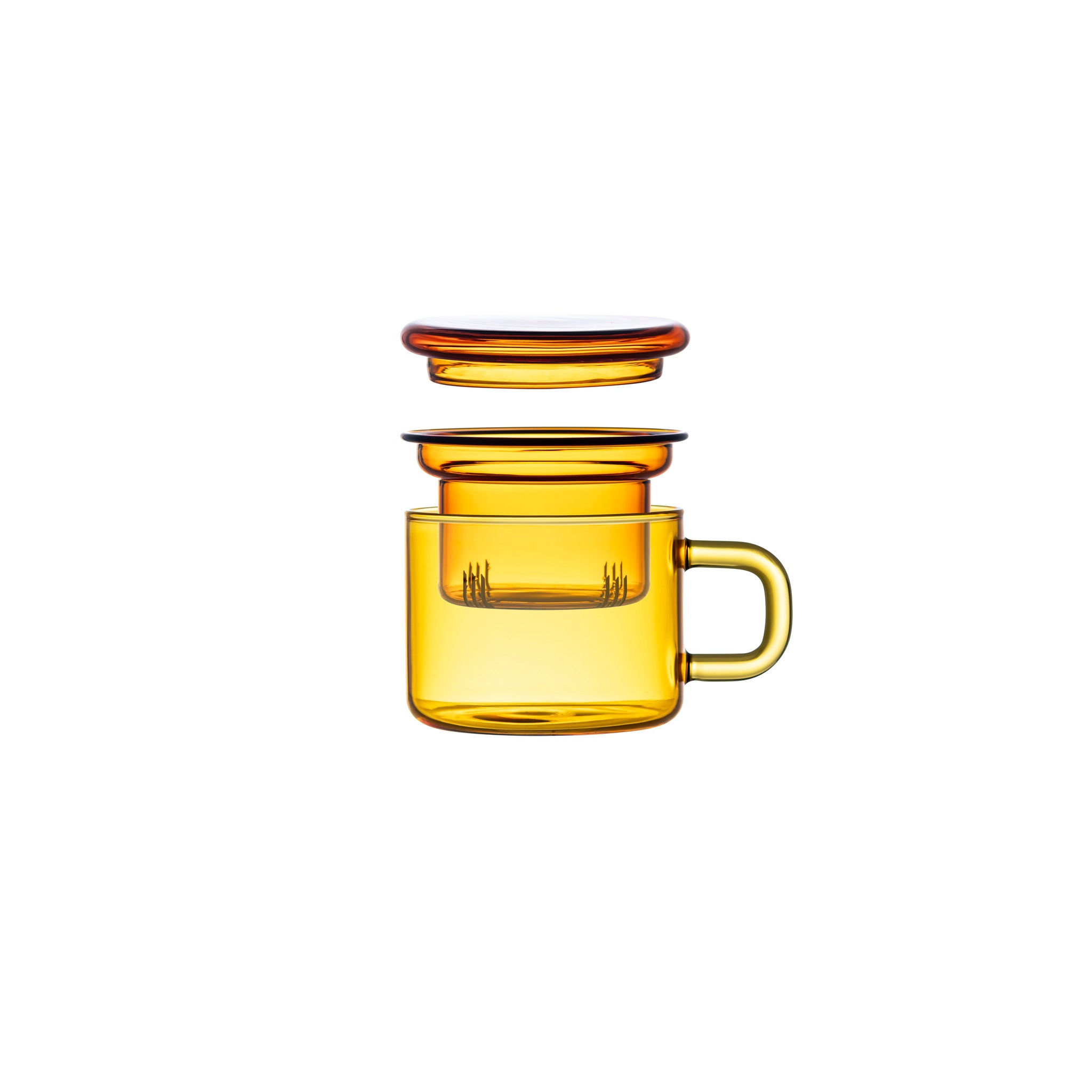 The Saffron Chá for One set with lid and infuser raised on a white background