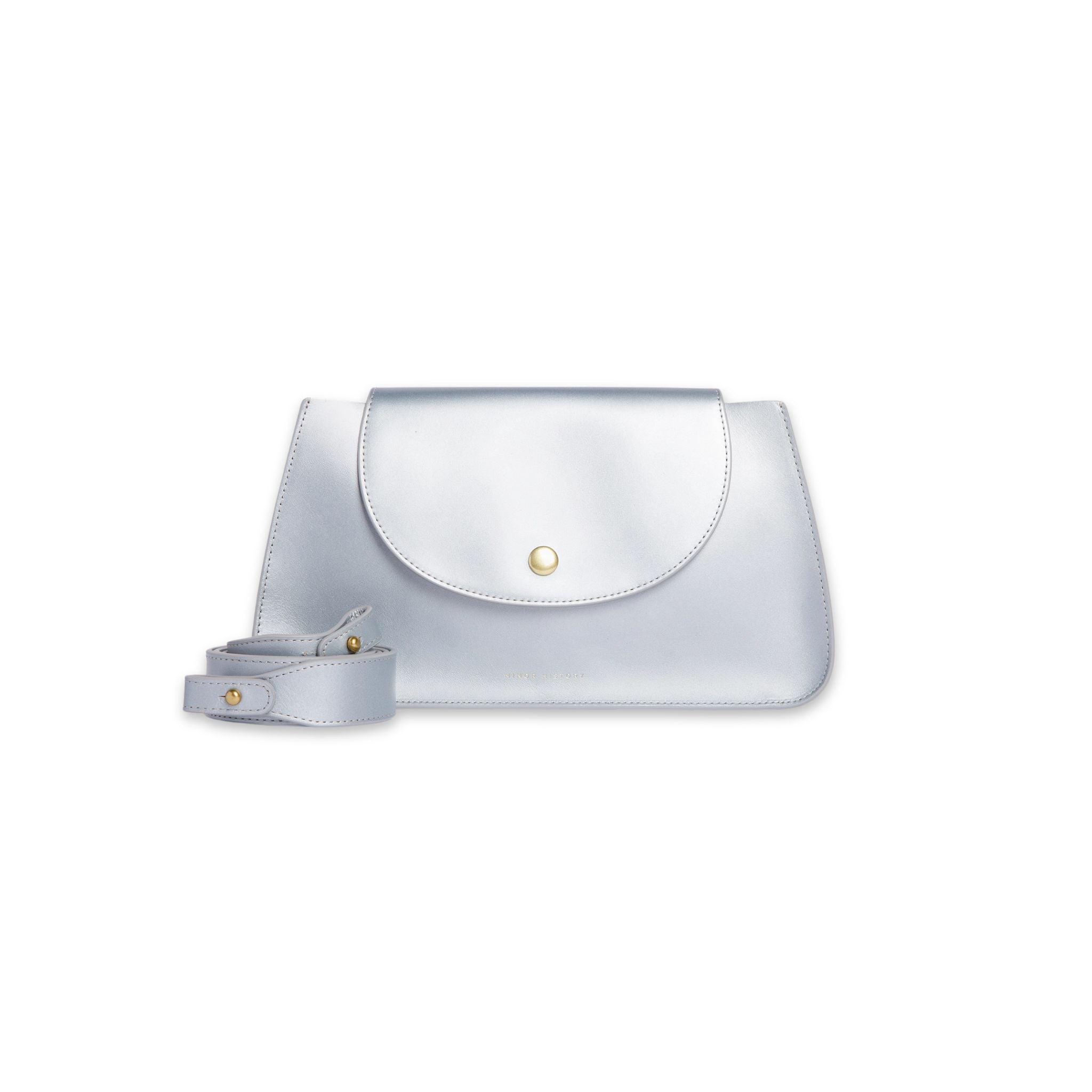 Minor History's The Horizon Crossbody bag sterling color front view with shoulder straps coiled and removed placed infront of bag