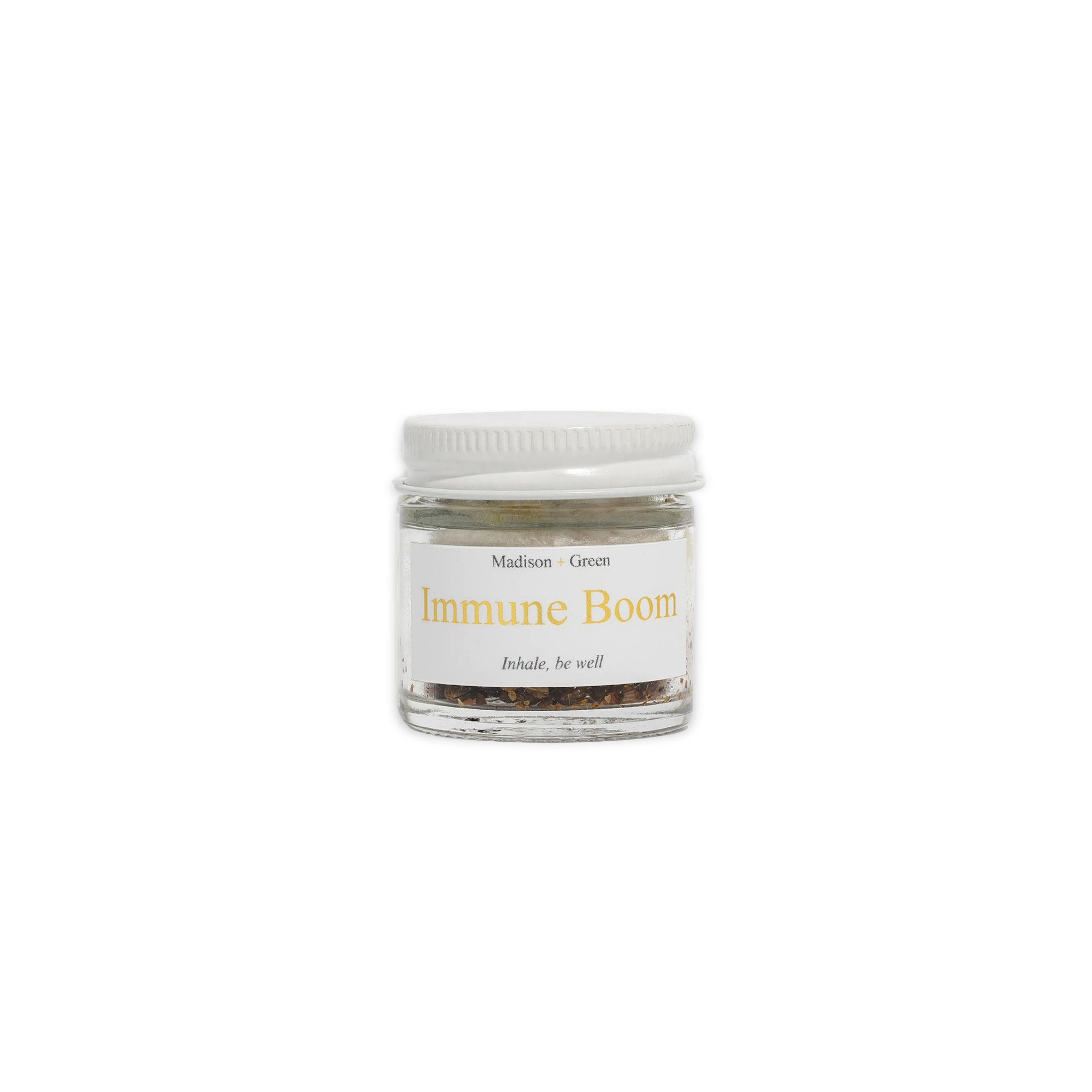 A jar of the 'Immune Boom' aromatherapy inhaler photographed on a plain white background.