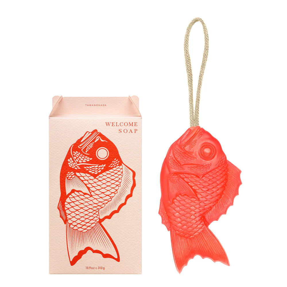 image of tamanohada welcome gift fish-shaped soap pomogranite color next to box