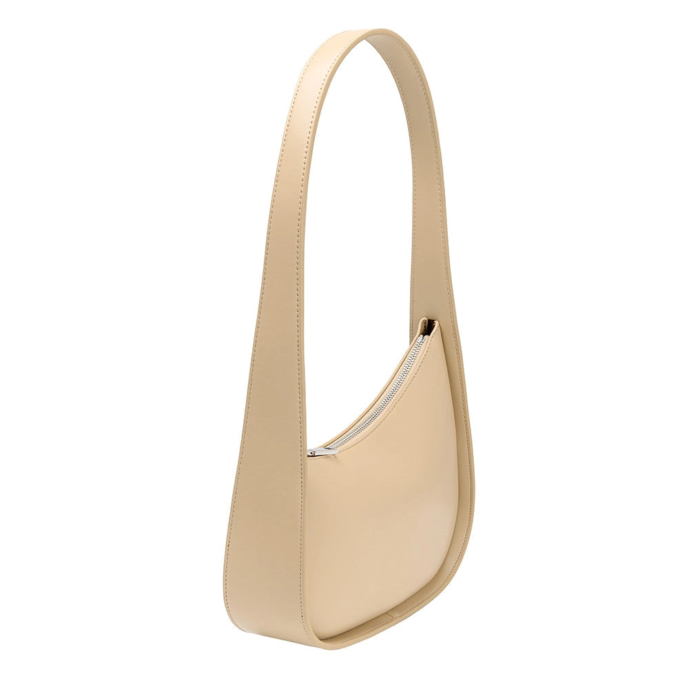 Angled view of the Willow recycled vegan shoulder bag in bone