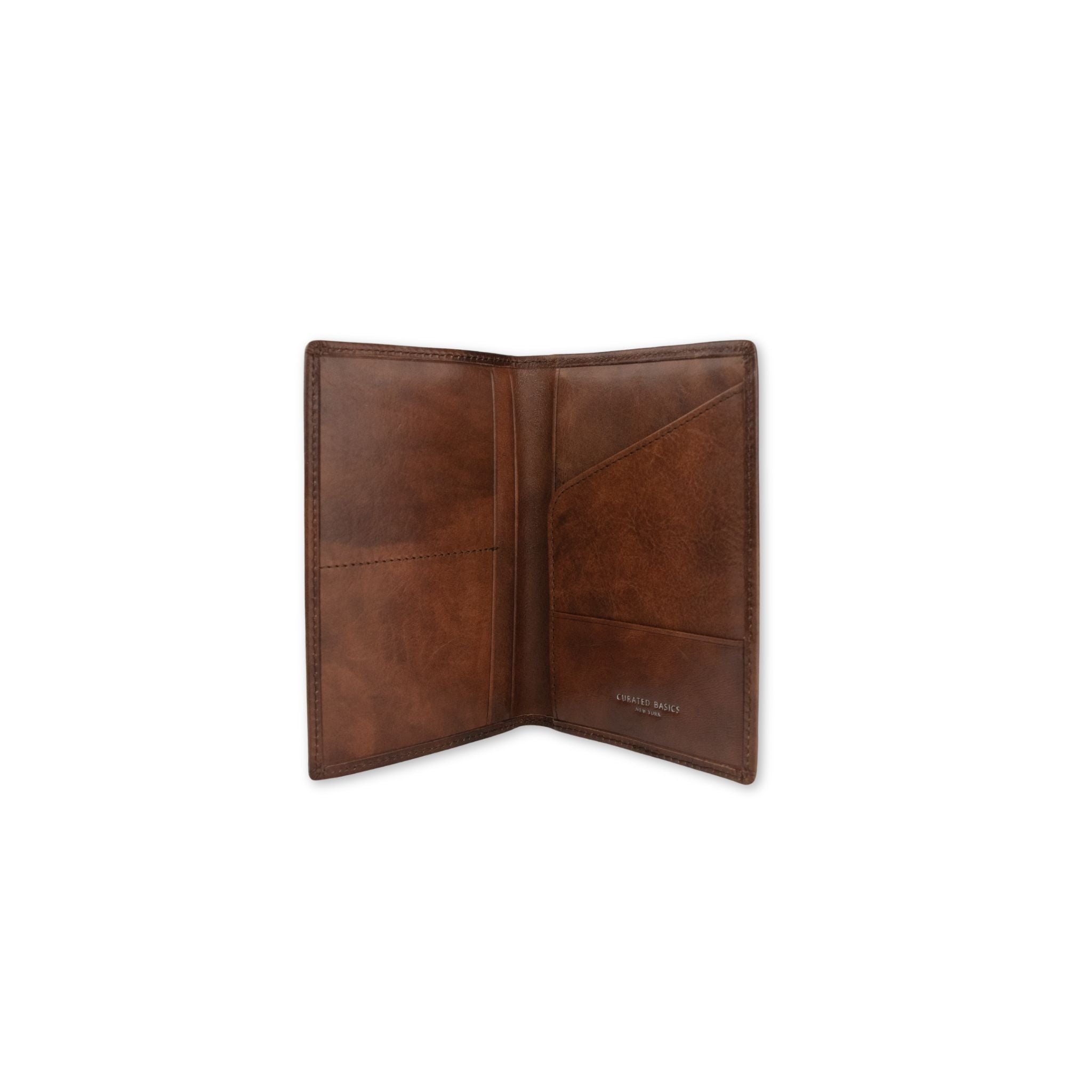 Inside brown leather passport holder on a white background
