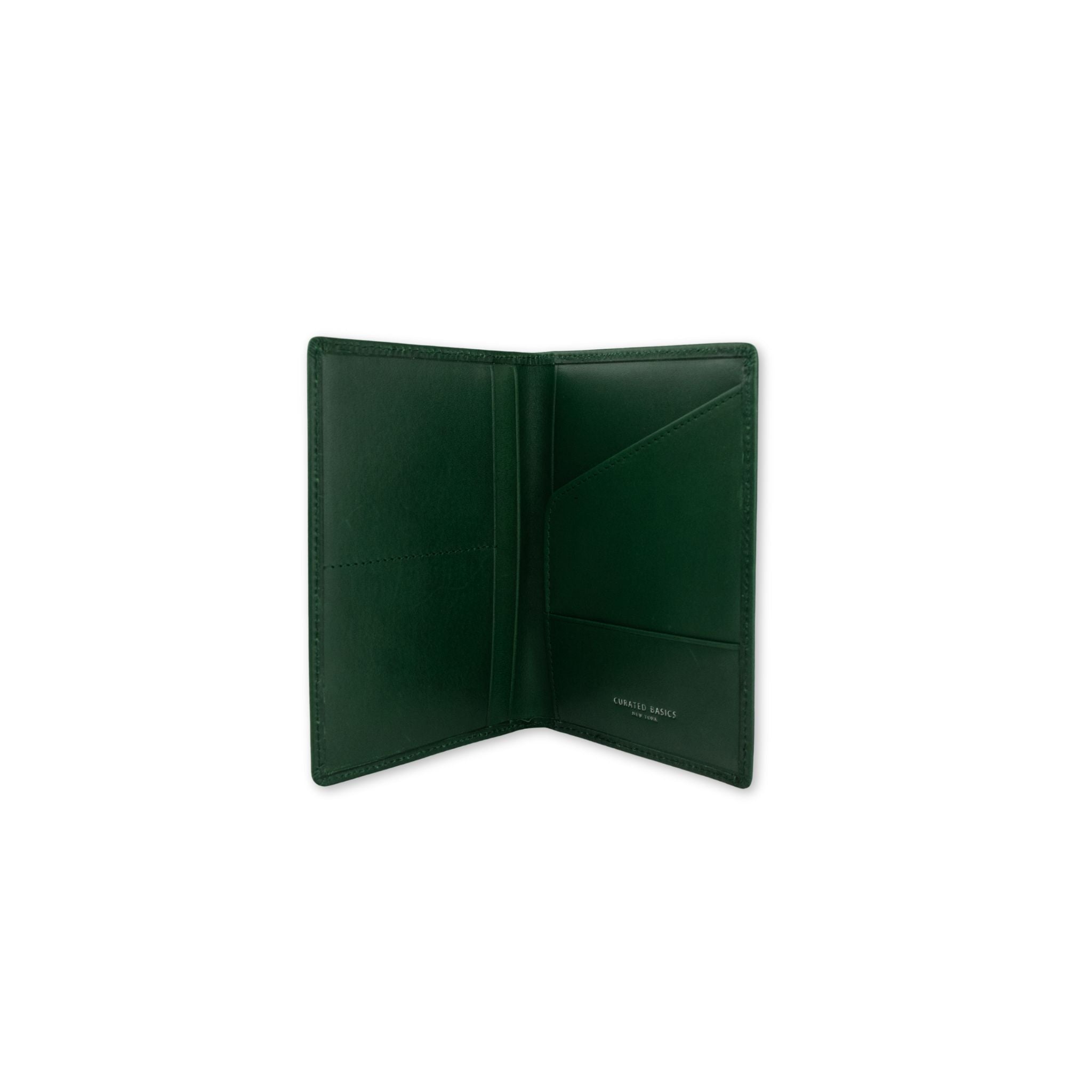Inside green leather passport holder on a white background