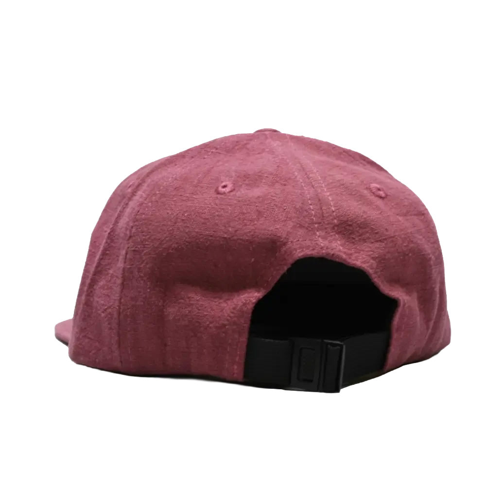 Maroon cap with a black strap on a white background