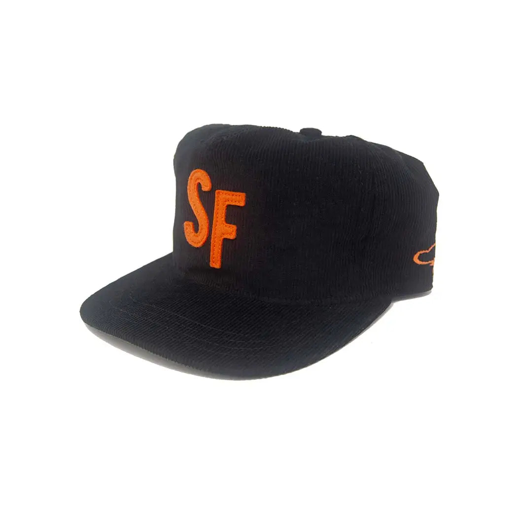 A black corduroy baseball cap featuring a prominent orange embroidered 'SF' logo on the front and a small orange logo on the side, set against a plain white background.