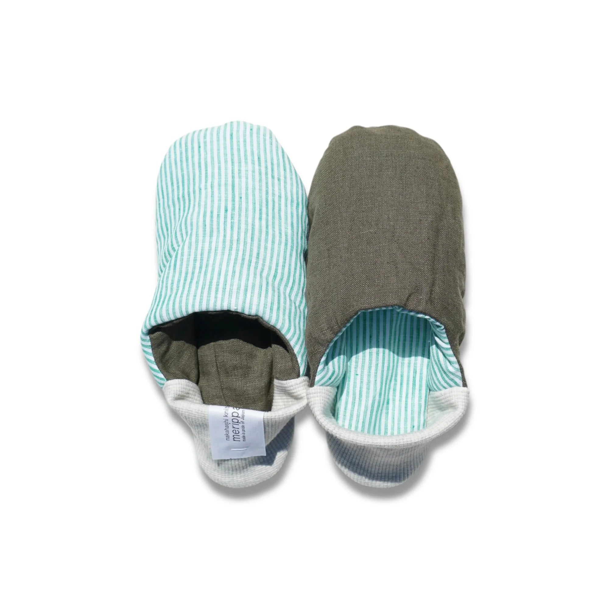 Pair of mint green and white striped slippers with light grey heels on a white background