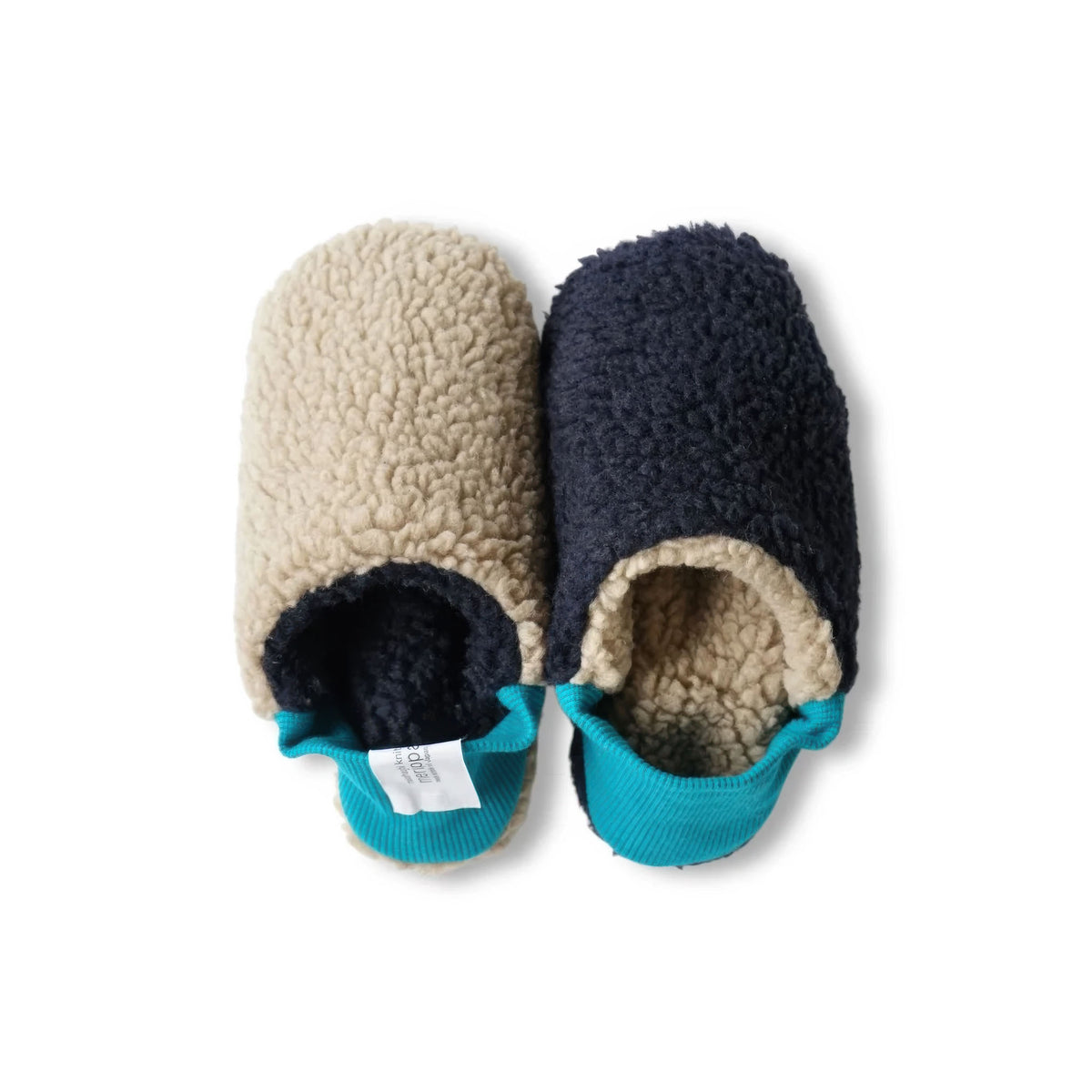 A pair of Merippa plush fleece slip-on slippers shown from above on a white background. One slipper is beige with a dark navy opening and turquoise trim, and the other is navy with a beige opening and turquoise trim.