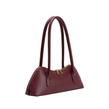 Angled view of the Dakota handbag in burgundy on a white background