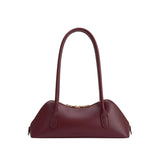 Back view of the Dakota handbag in burgundy on a white background