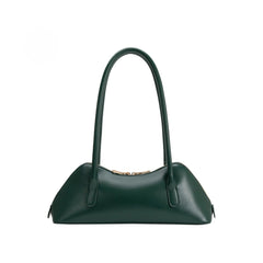 The Dakota green handbag on a white background