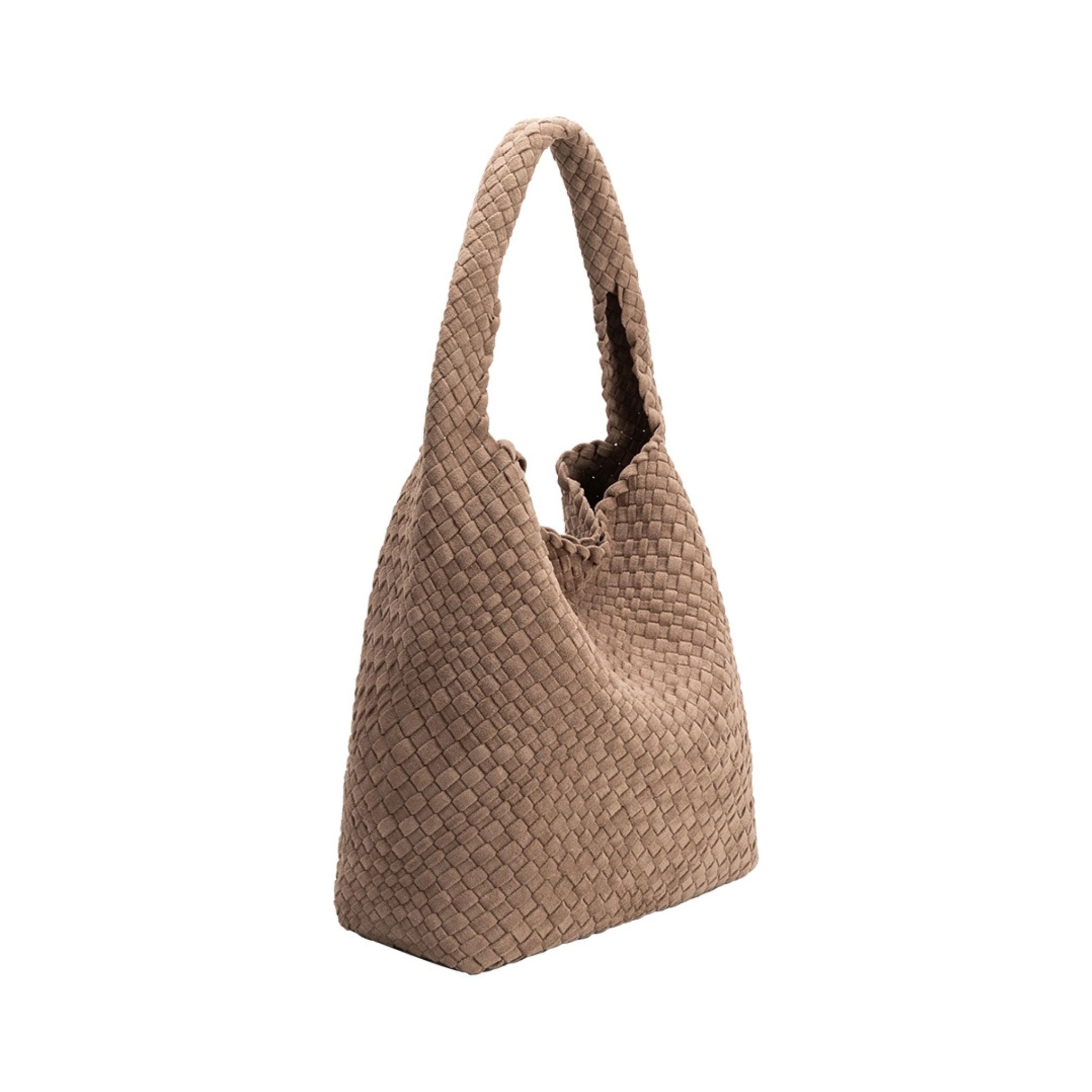 Angled view of Johanna vegan suede in clay handbag on a white background