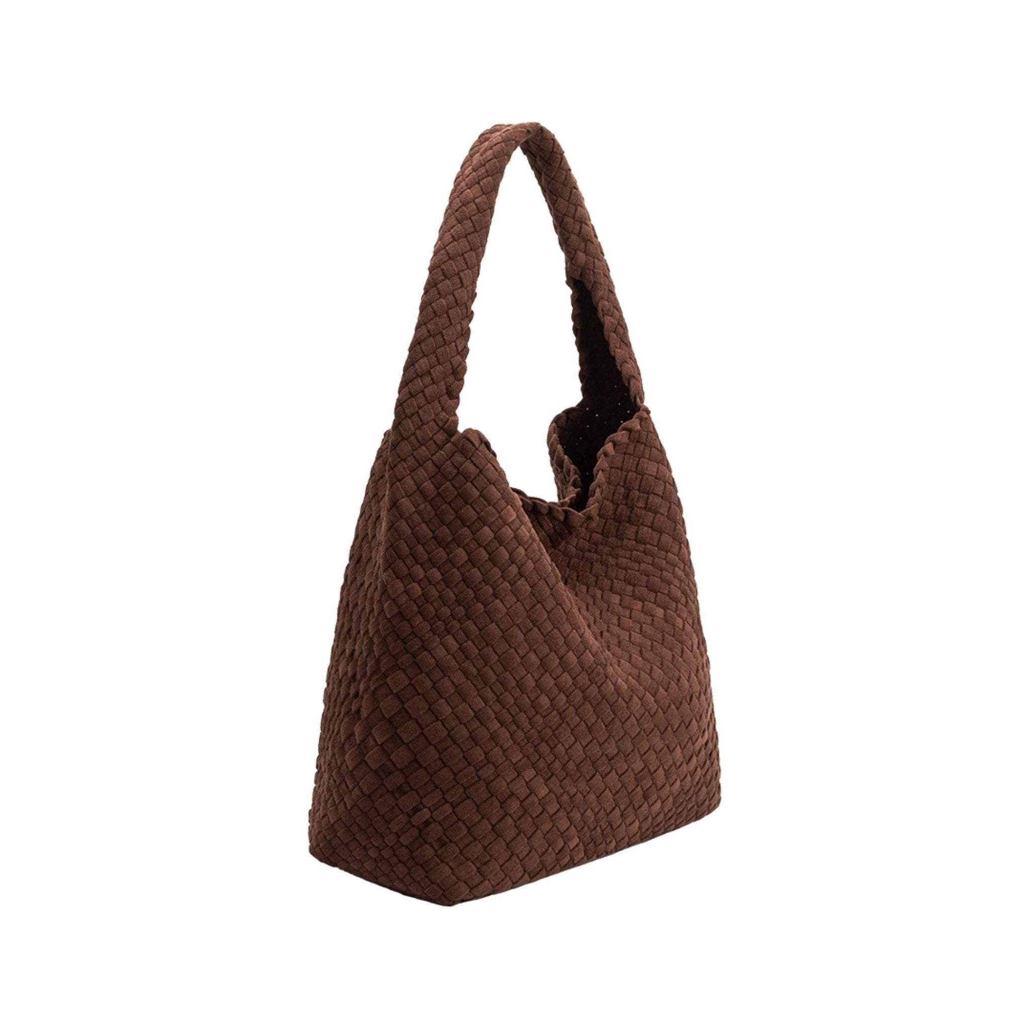 Angled view of Johanna vegan suede in tobacco handbag on a white background