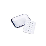 White soap dish with blue rim on a white background