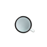 White mug with black rim on a white background
