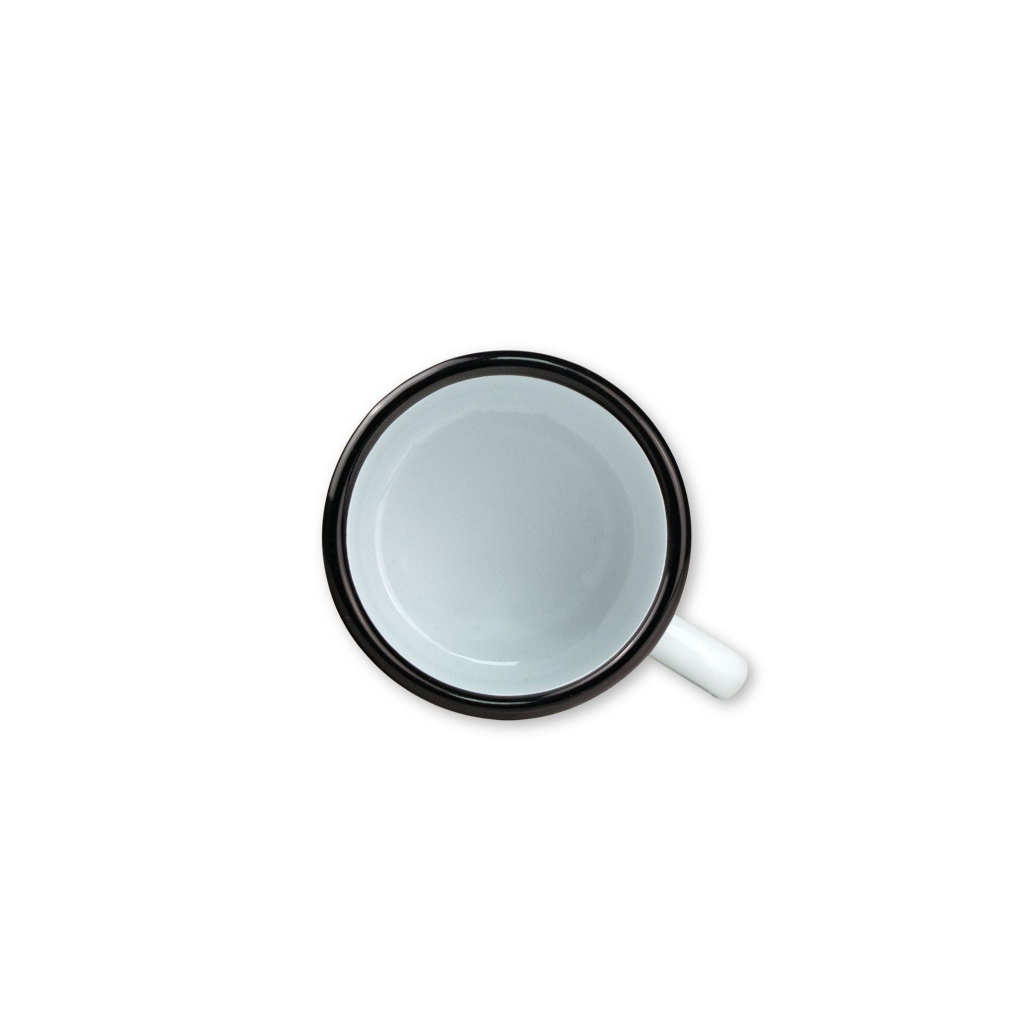 White mug with black rim on a white background