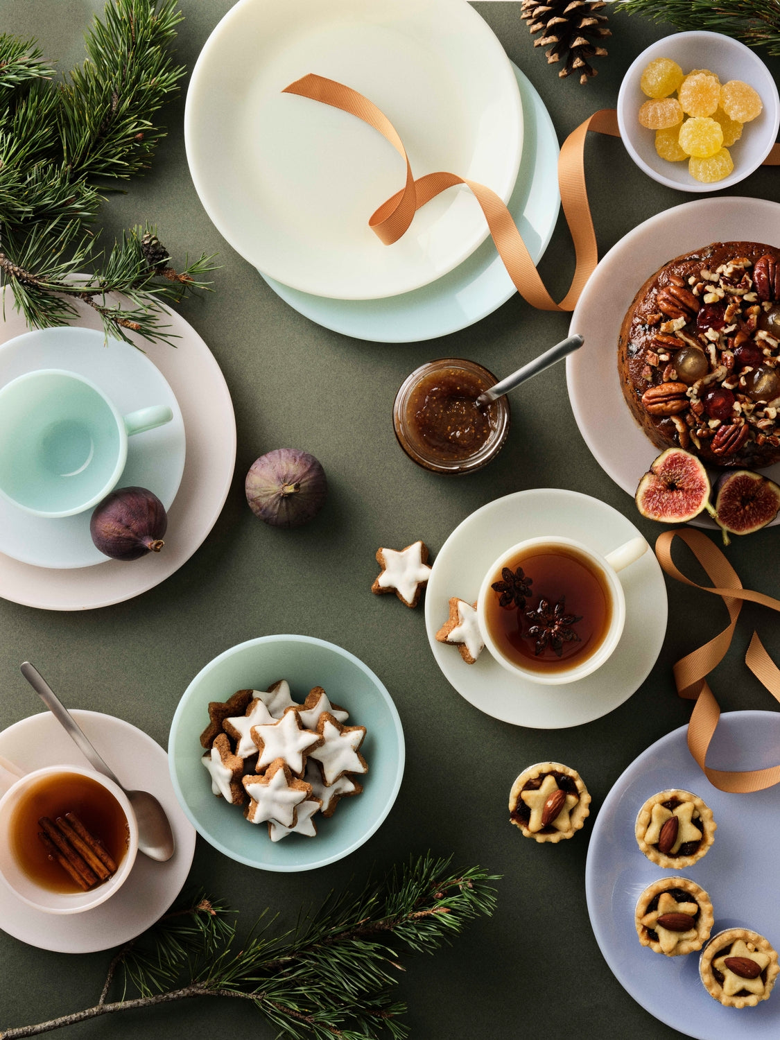 A holiday festive dining table set with MILK tableware 