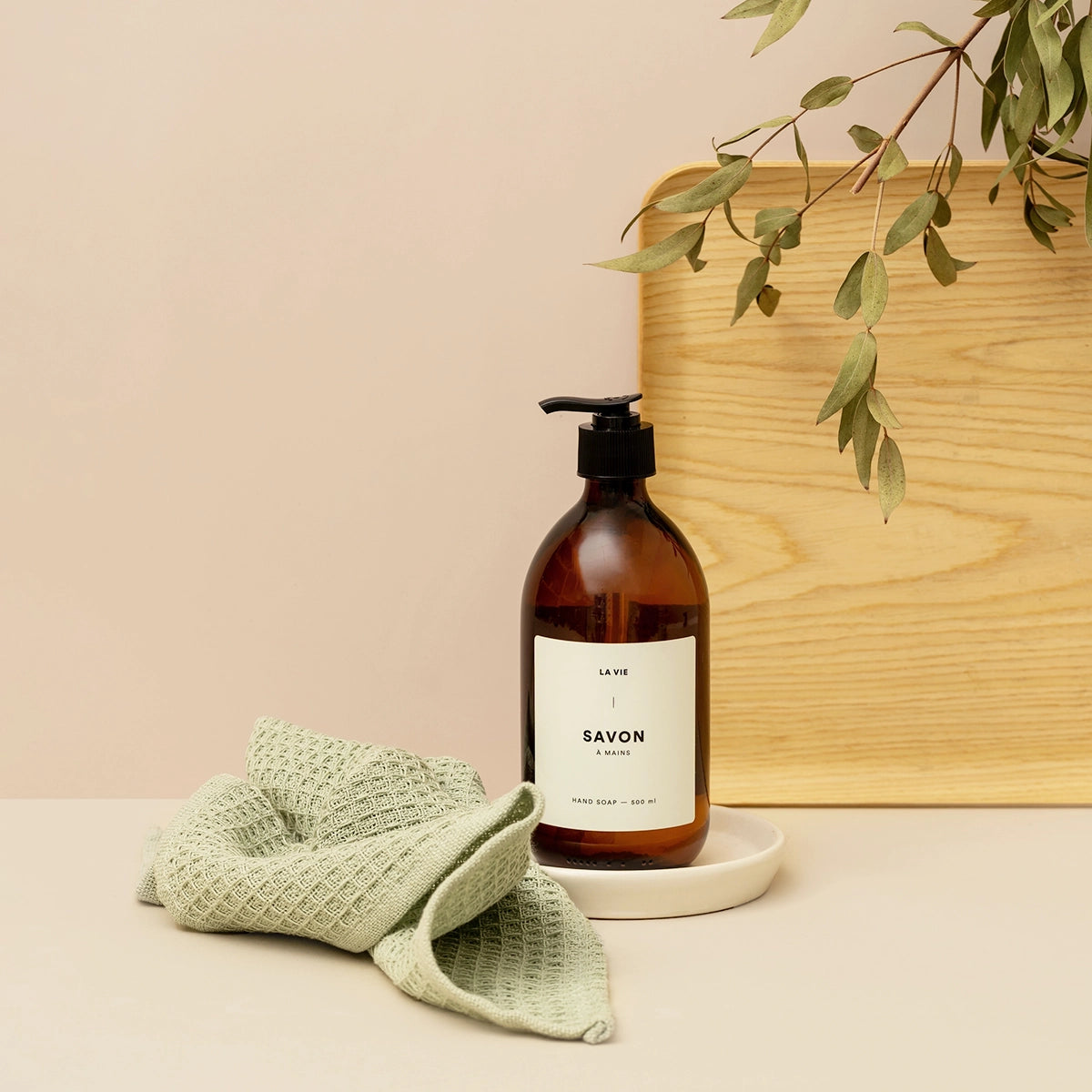 image of hand soap bergamot bottle on table top