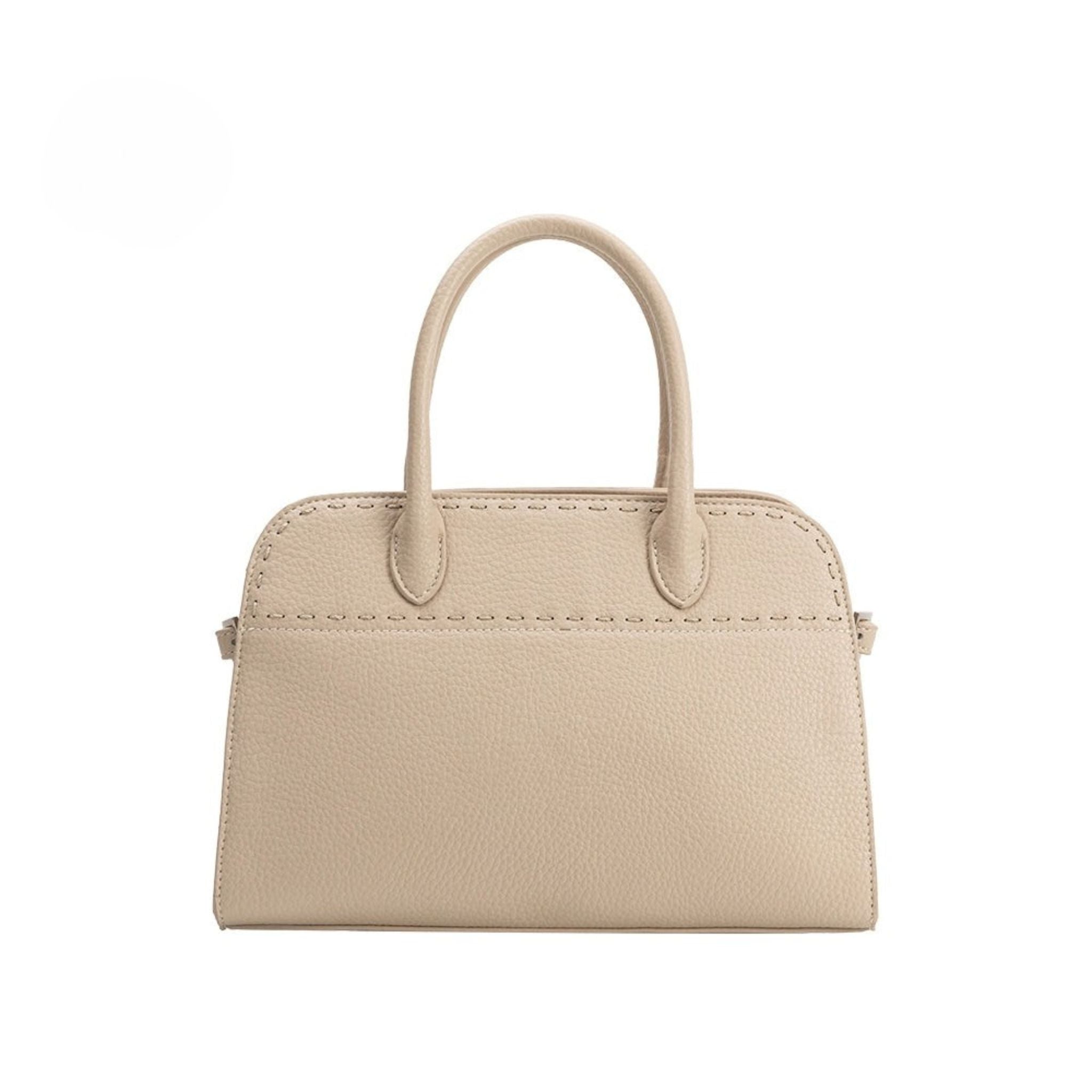 Beige handbag with a textured surface on a white background