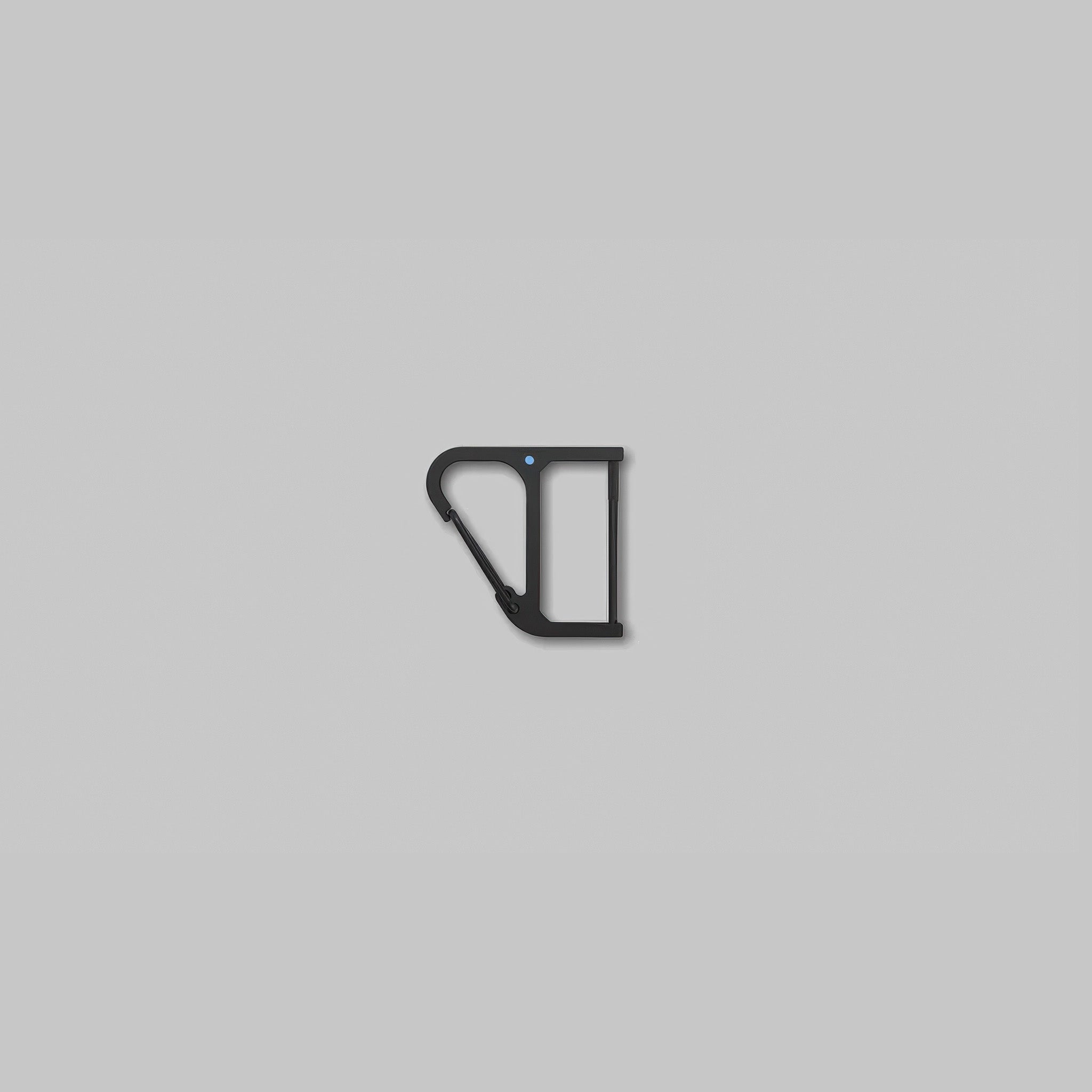 CW&T's black titanium key wrangler against a light grey background
