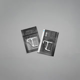 CW&T's key wranglers enclosed in its packaging on a grey background