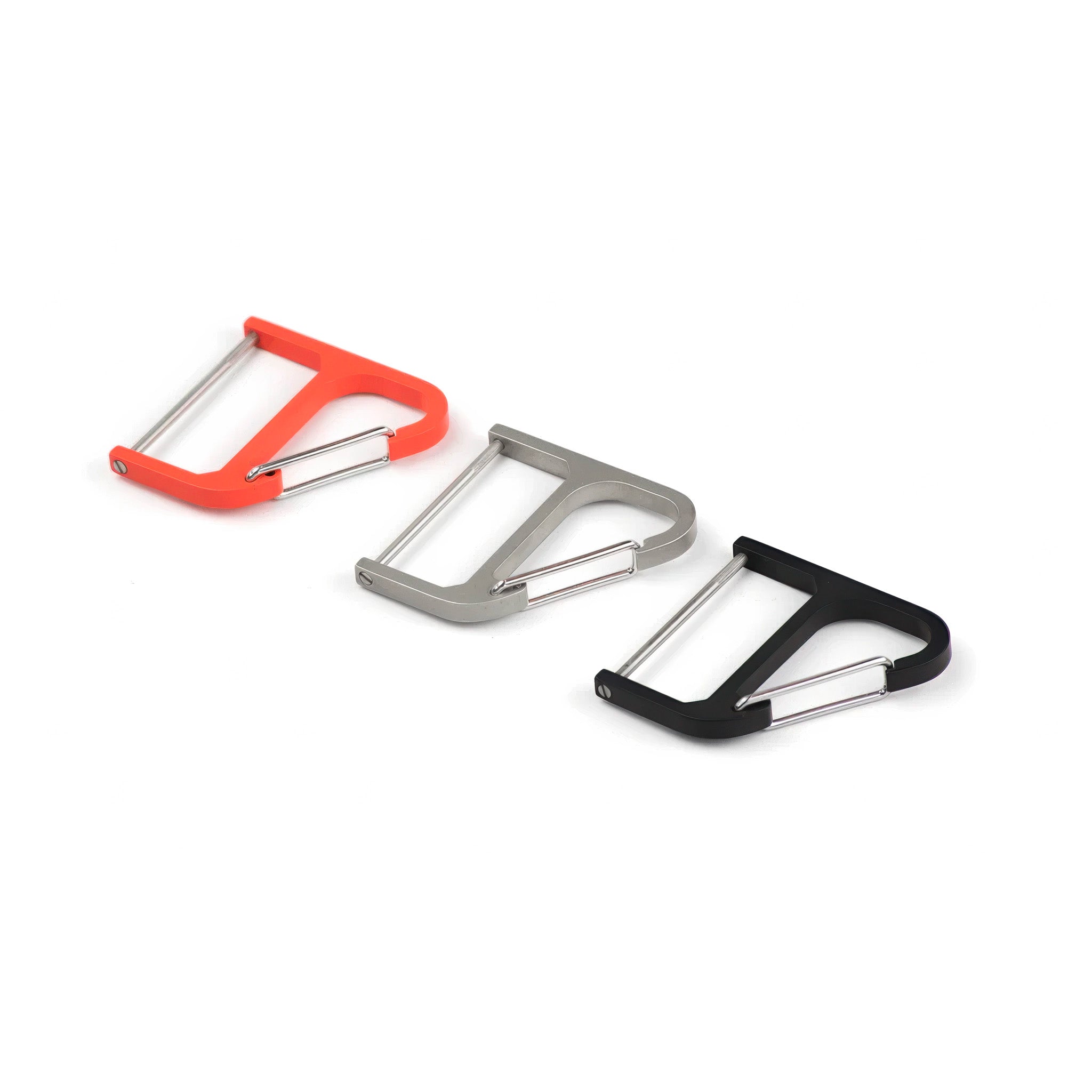 Three titanium key wranglers in orange, silver, and black on a white background