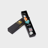 Min & Mon's Bloomoo Charm - Orange and Blue 3D Printed Bioplastic Keychain in its retail packaging box