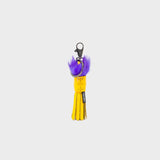 Back of Min & Mon's Markets - Callie Marie Mayne - Light Yellow Leather and Purple Fur Keychain on a white background