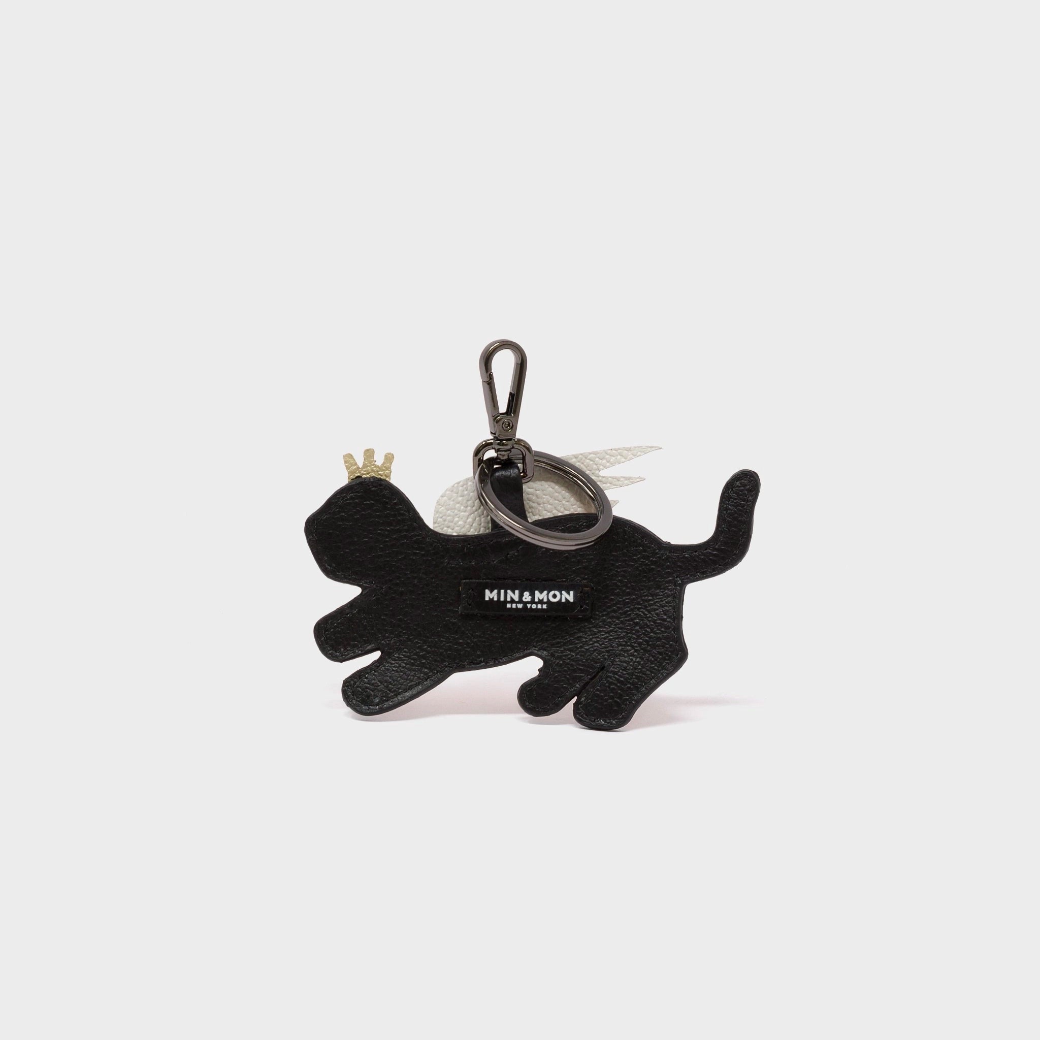 The flip side of Min & Mon's Theo the Tiger keychain - all black with company branding
