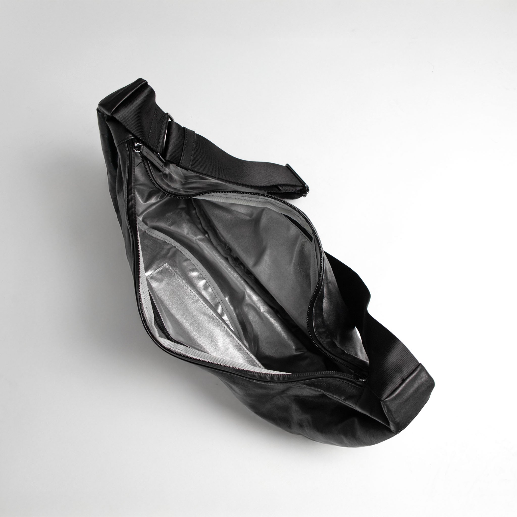 Close up inside image of hmny' s Buddy Bag on a light background