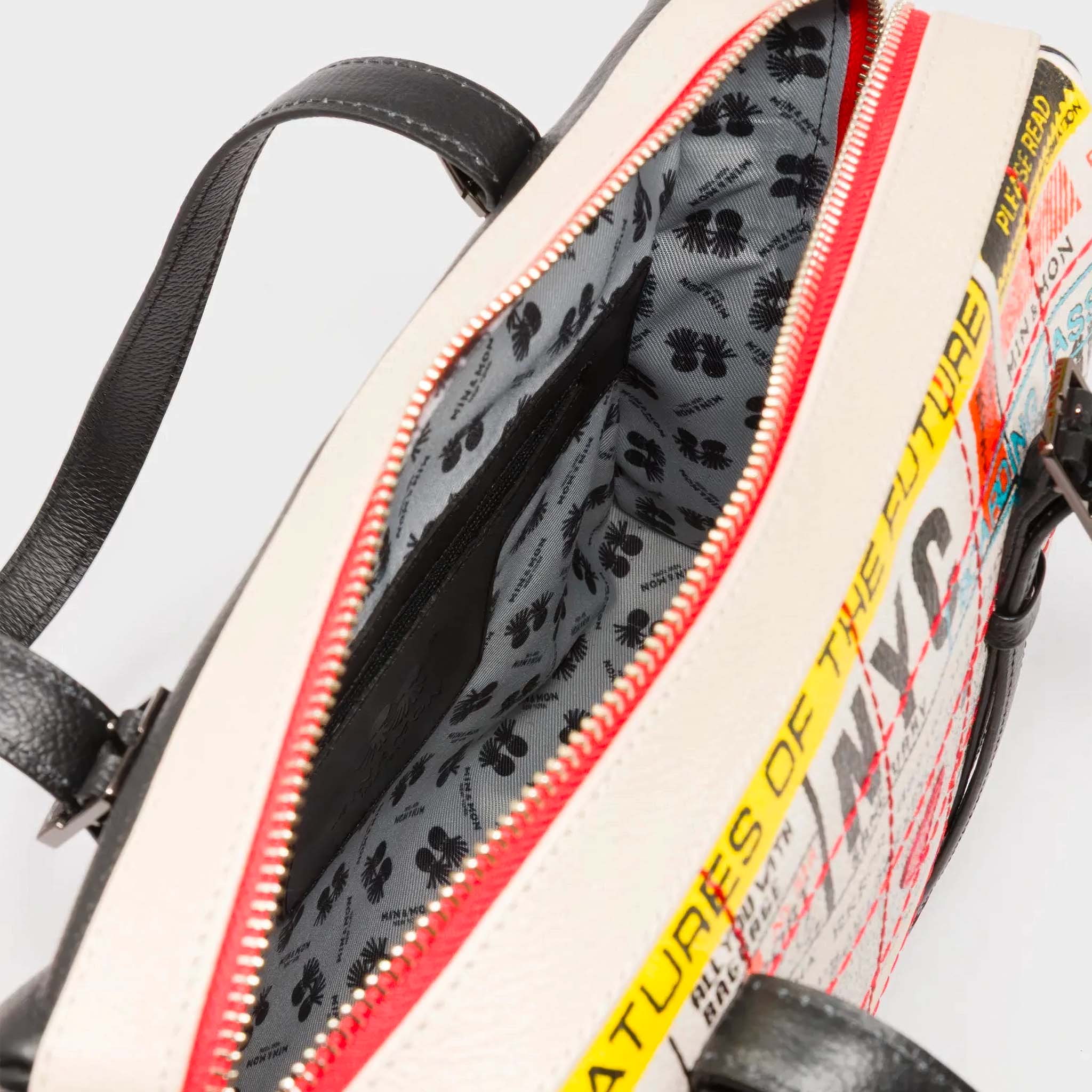 Close up of inside Min & Mon's Esther Cream and Black Satchel Bag - Kind Type Design