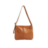 Brown leather messenger  bag on a white background