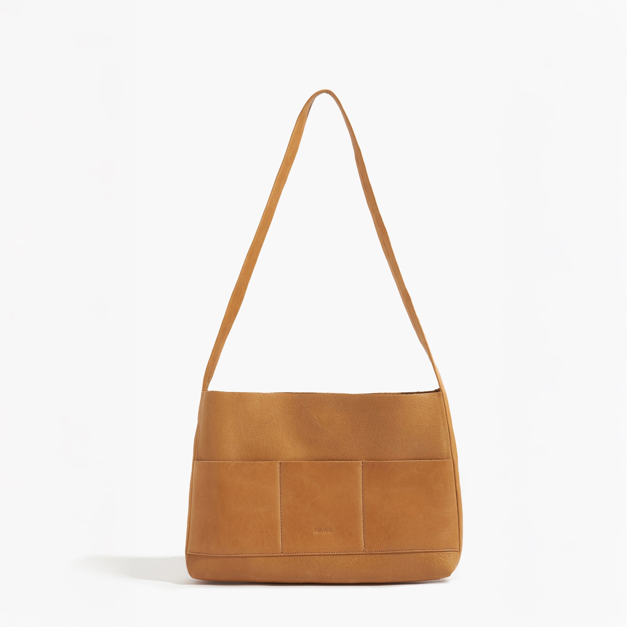 Saddle mini bonarda leather handbag on a white background