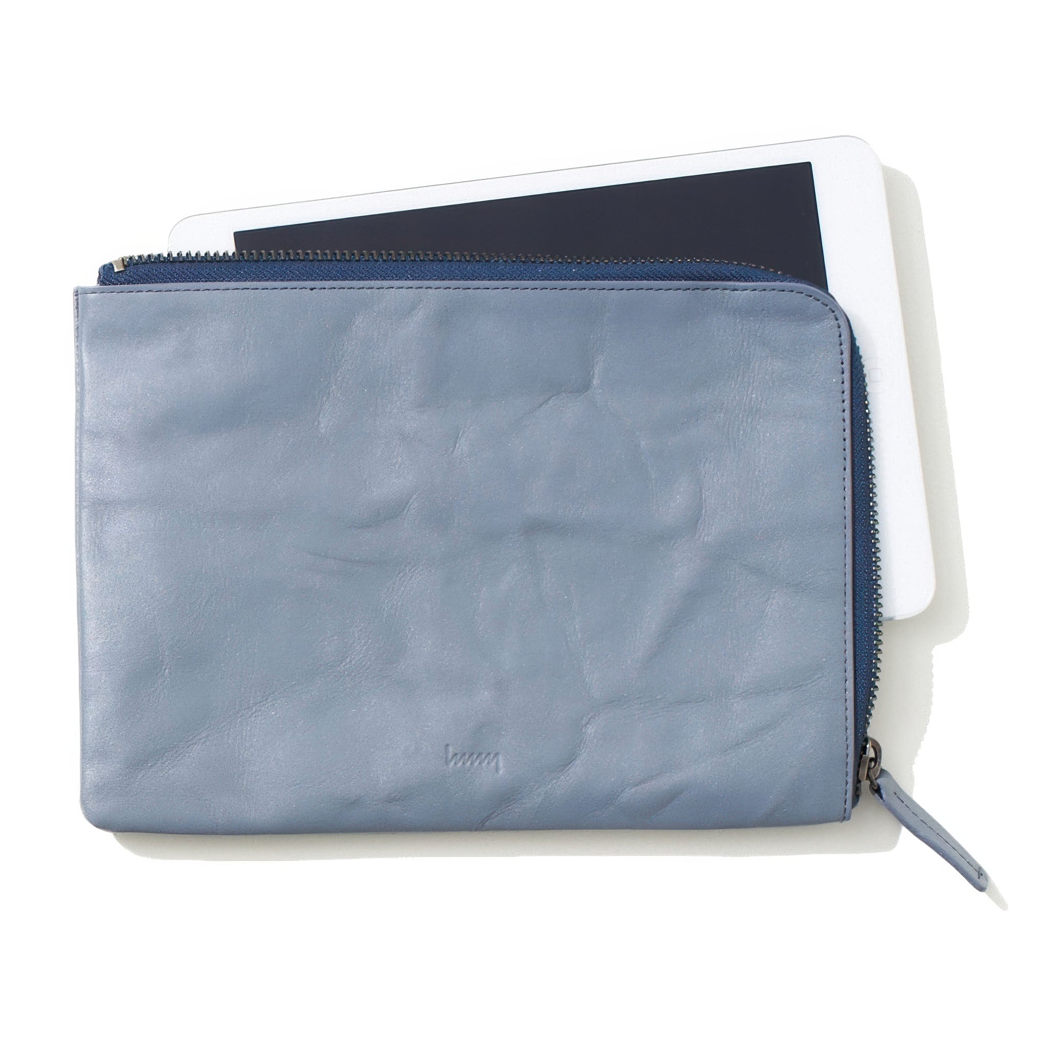 hmny's gray 10 mile bag  with a white tablet on a white background