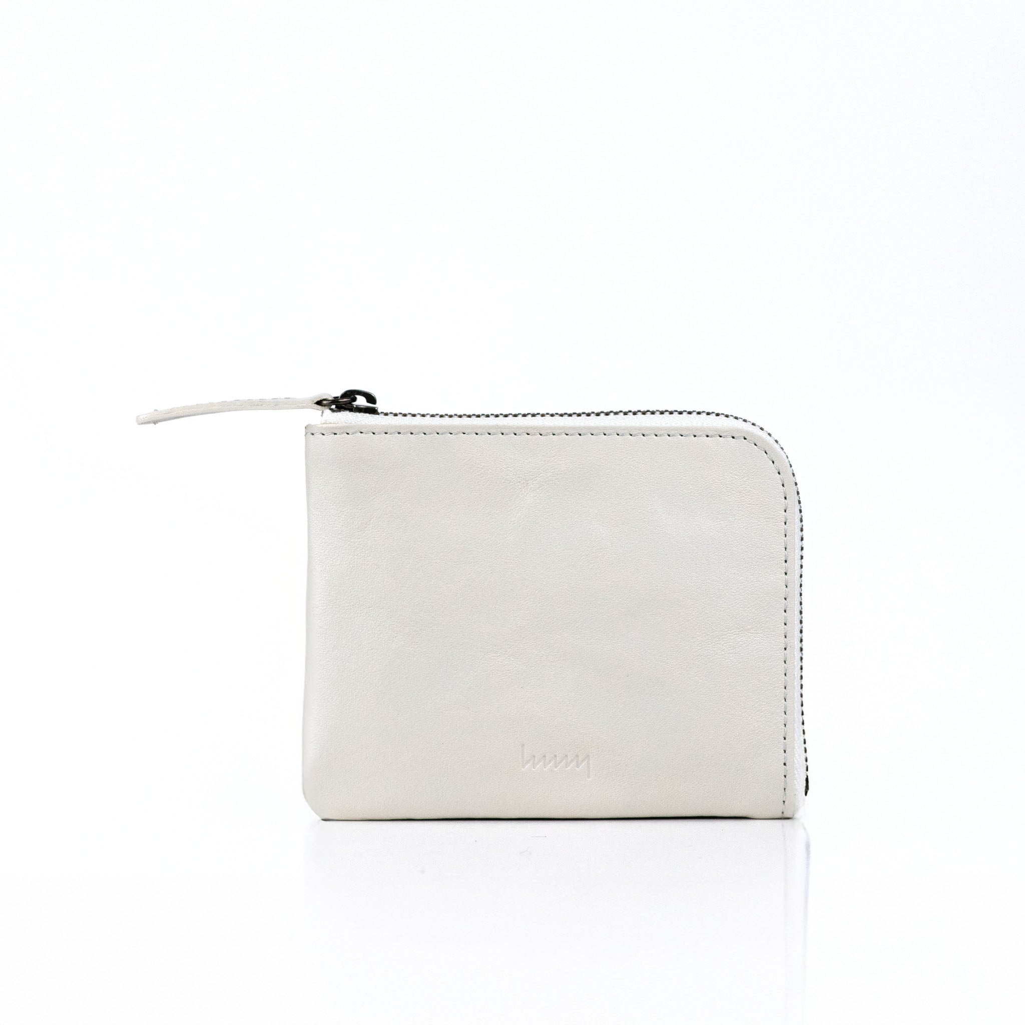 hmny's compact wallet in light grey on a white background