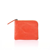 hmny's compact wallet in orange on a white background