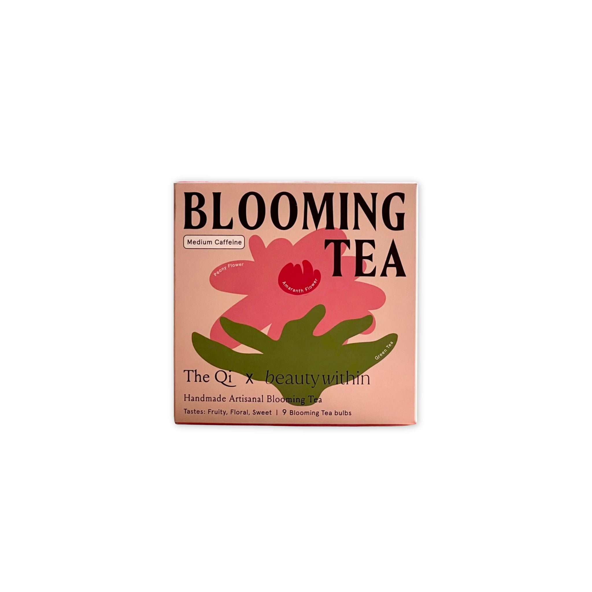 Box of Blooming Tea with floral design on a white background