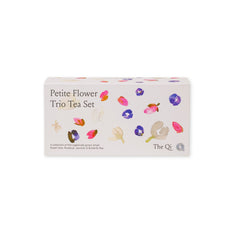Box of Petite Flower Trio Tea Set with colorful floral designs on a white background