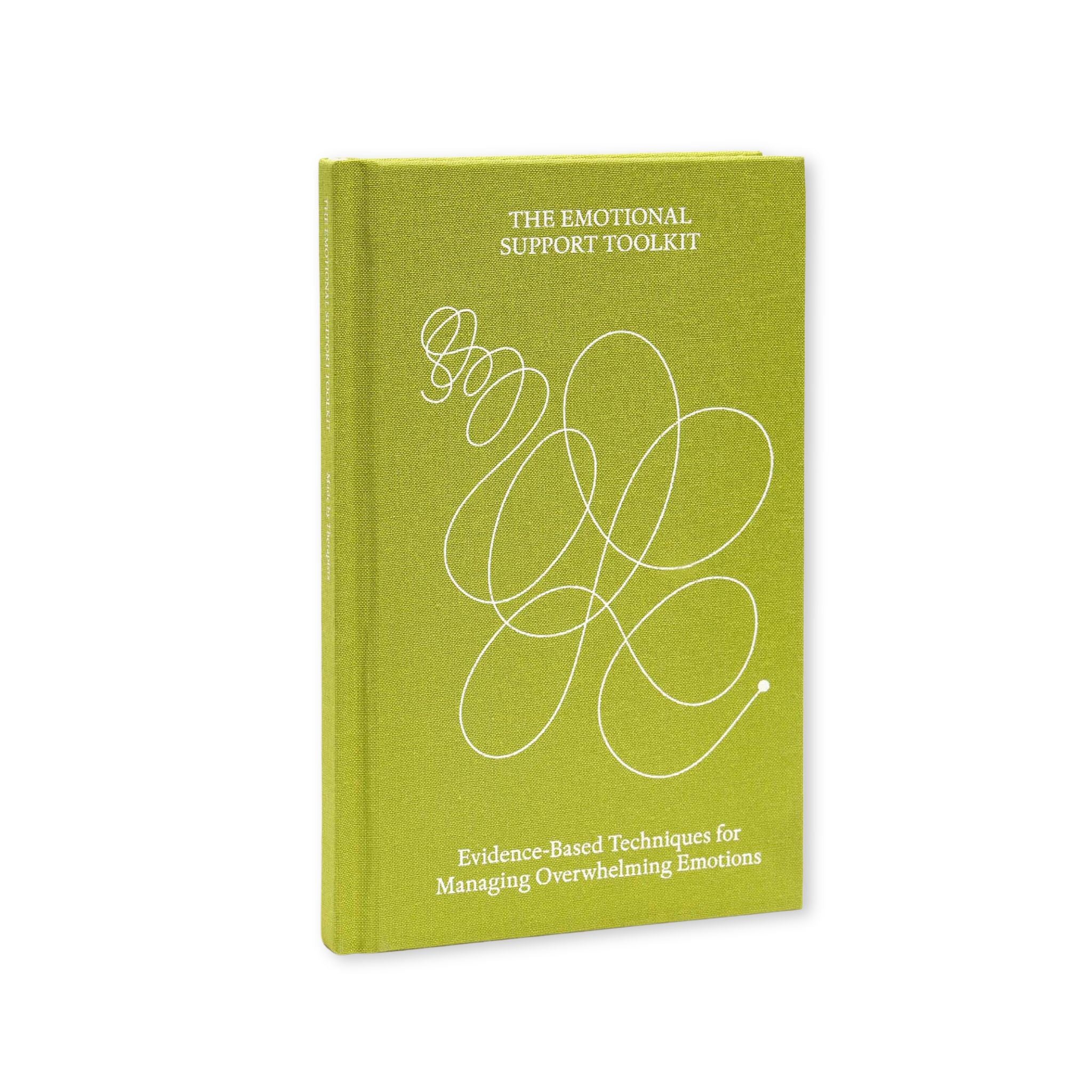Green notebook titled 'The Emotional Support Toolkit' on a white background