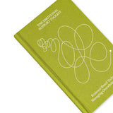 Green notebook titled 'The Emotional Support Toolkit' on a white background