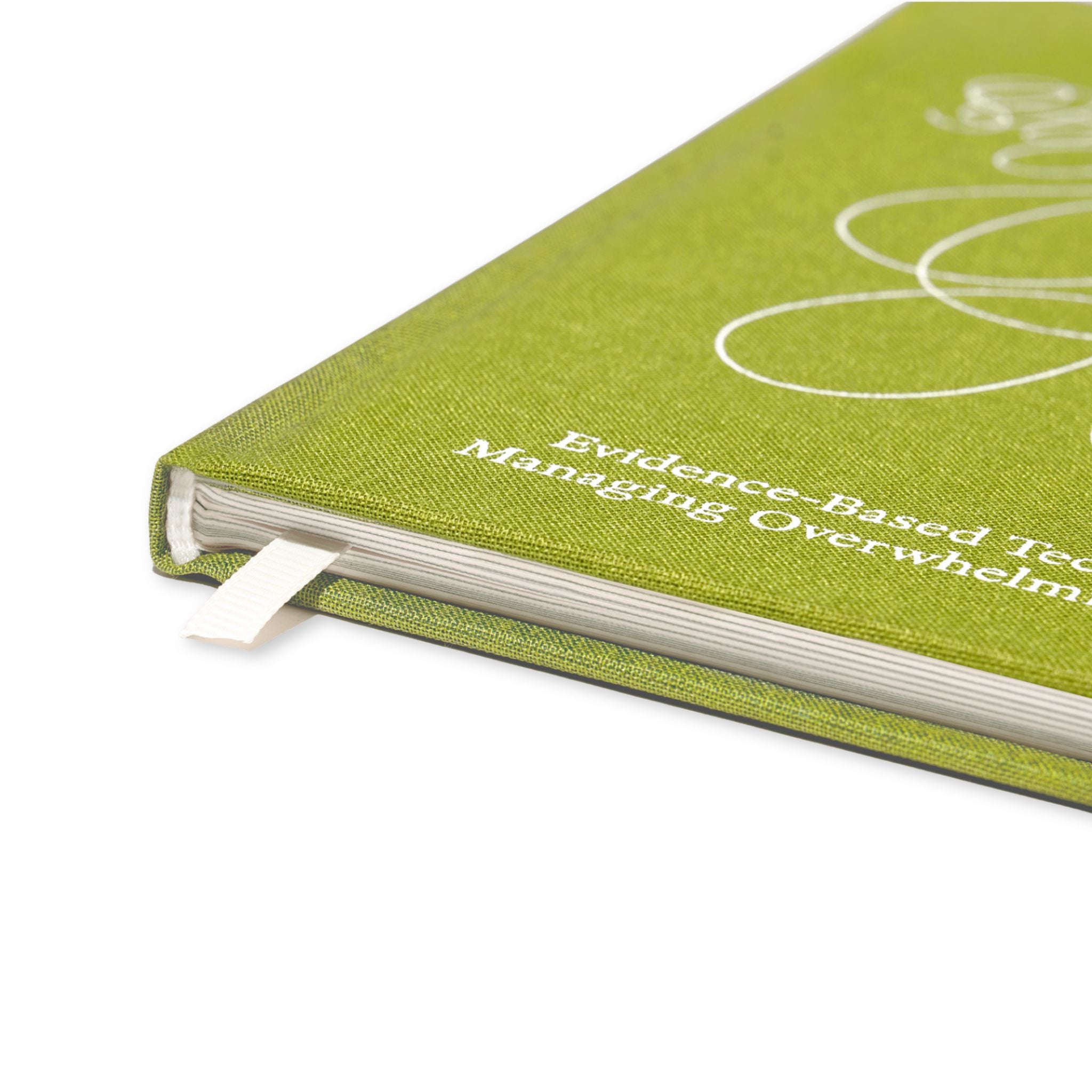 Green notebook titled 'The Emotional Support Toolkit' on a white background